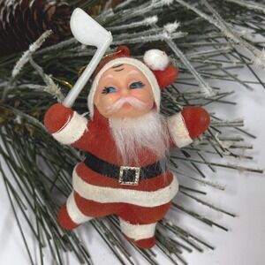 Vintage flocked Santa golfer ornament: Kitschy Christmas decor